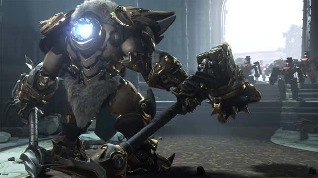 Overwatch's Reinhardt stands before an army of combat robots in this screenshot. 