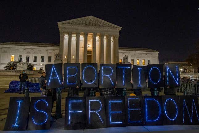 WASHINGTON, DC - NOVEMBER 30: Activists Hold Light Brigade Urging 'Abortion Is Essential at the Supreme Court on November 30, 2021 in Washington, DC. (Photo by Tasos Katopodis/Getty Images for UltraViolet)