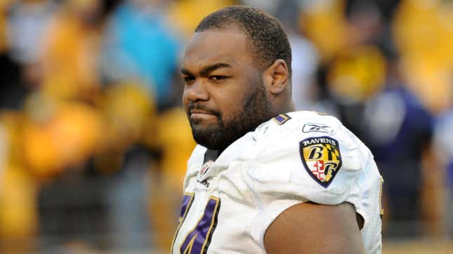 Michael Oher on football field in Baltimore Ravens uniform