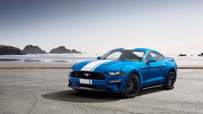 A photo of a blue Ford Mustang muscle car. 