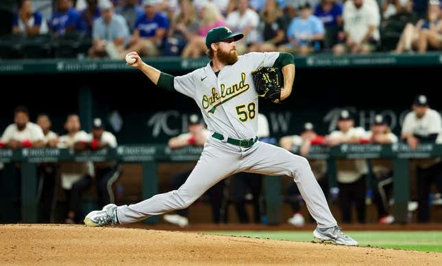 Sep 8, 2023; Arlington, Texas, USA;  Oakland Athletics starting pitcher Paul Blackburn (58) throws during the second inning against the Texas Rangers at Globe Life Field.