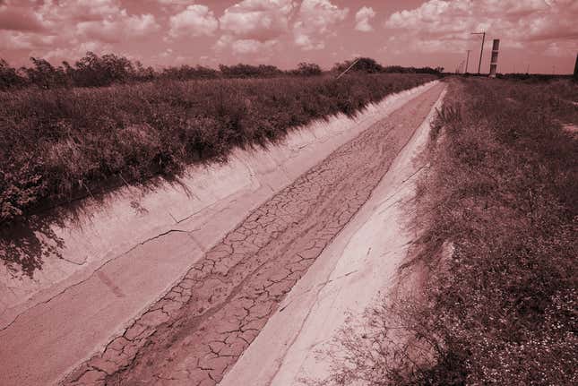 Earthen canals like the one pictured above near Raymondville, Texas, leak like a sieve, losing much of the water they carry before reaching their destinations.
