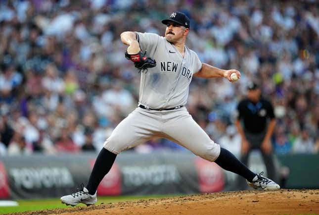 Jul 14, 2023; Denver, Colorado, USA; New York Yankees starting pitcher Carlos Rodon (55) pitches in fifth inning against the Colorado Rockies at Coors Field.