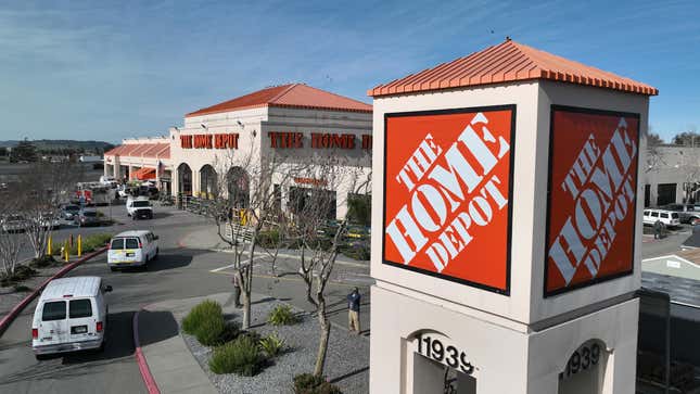 In an aerial view, a sign is seen posted on the exterior of a Home Depot store on February 21, 2023 in El Cerrito, California. Home improvement retailer Home Depot announced plans to spend an estimated $1 billion to raise pay and benefits for hourly workers at its stores.