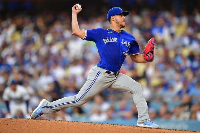 Jul 24, 2023; Los Angeles, California, USA; Toronto Blue Jays starting pitcher Jose Berrios (17) throws against the Los Angeles Dodgers during the first inning at Dodger Stadium.
