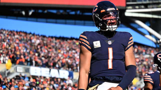 Chicago Bears quarterback Justin Fields (1) works in the pocket against the  Atlanta Falcons during the first half of an NFL football game, Sunday, Nov.  20, 2022, in Atlanta. (AP Photo/John Bazemore