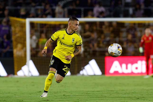 Sep 16, 2023; Orlando, Florida, USA; Columbus Crew midfielder Alexandru Matan (20) chases the ball against Orlando City SC in the second half at Exploria Stadium.