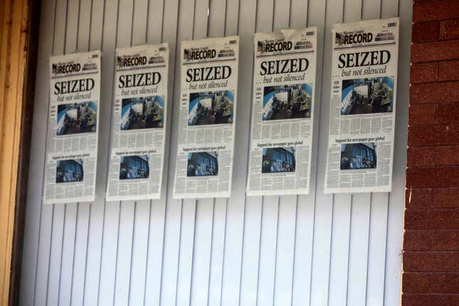 Front pages for the Marion County Record&#39;s latest weekly edition are displayed on a window at its offices, Monday, Aug. 21, 2023, in Marion, Kansas. Local police raided the newspaper&#39;s offices and home of its publisher, bringing the small central Kansas town to international attention. (AP Photo/John Hanna)