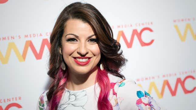 Anita Sarkeesian stands for a photo at the Women's Media Center Awards.