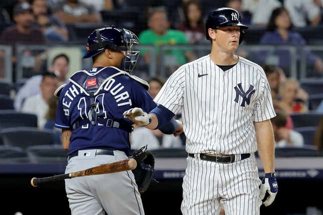 Aug 1, 2023; Bronx, New York, USA; New York Yankees third baseman DJ LeMahieu (26) reacts after striking out to end the seventh inning against the Tampa Bay Rays at Yankee Stadium.