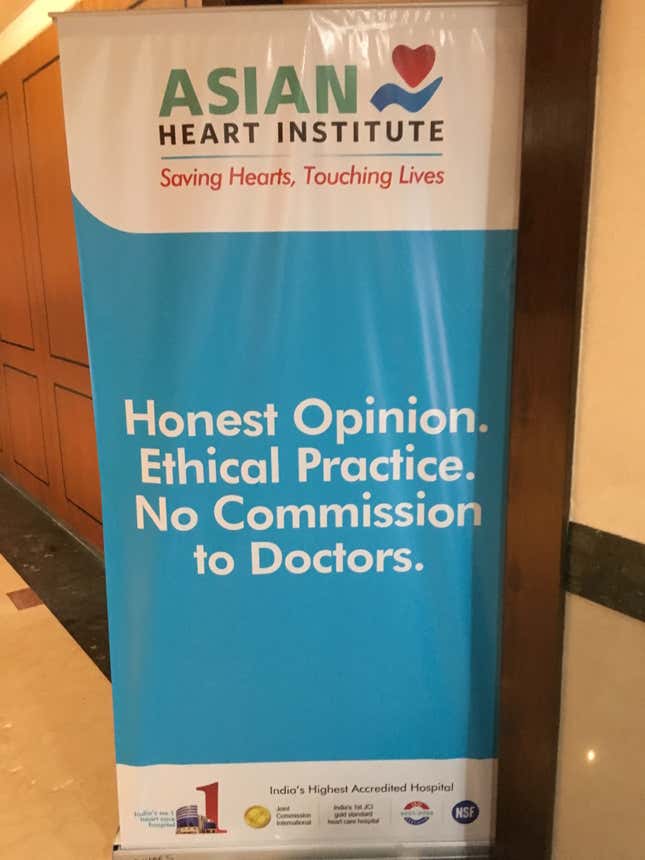 A sign at a conference at the Asian Heart Hospital in Mumbai, which has started a campaign against cut-practice.