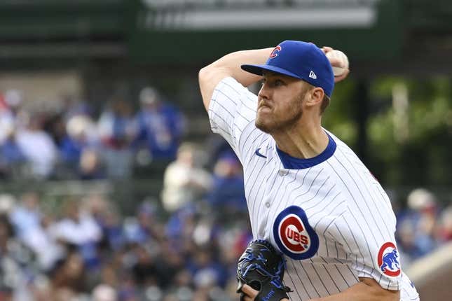 May 27, 2023; Chicago, Illinois, USA;  Chicago Cubs starting pitcher Jameson Taillon (50) delivers against the Cincinnati Reds during the first inning at Wrigley Field.