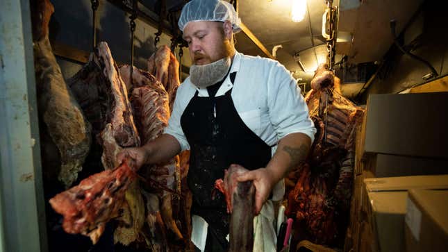 Butchers at Old Fashion Country Butcher process meat as they work to meet increased demand due to COVID-19 related shortages on May 21, 2020 in Santa Paula, California. T