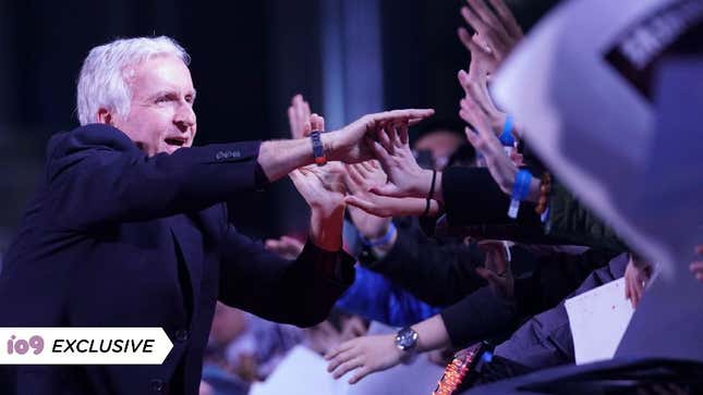 James Cameron high-fives fans at an Alita event.