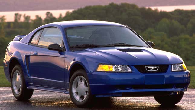 A photo of a blue SN95 Ford Mustang.