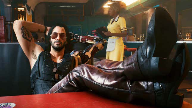 A screenshot shows Keanu Reeves in Cyberpunk 2077 sitting in a café. 