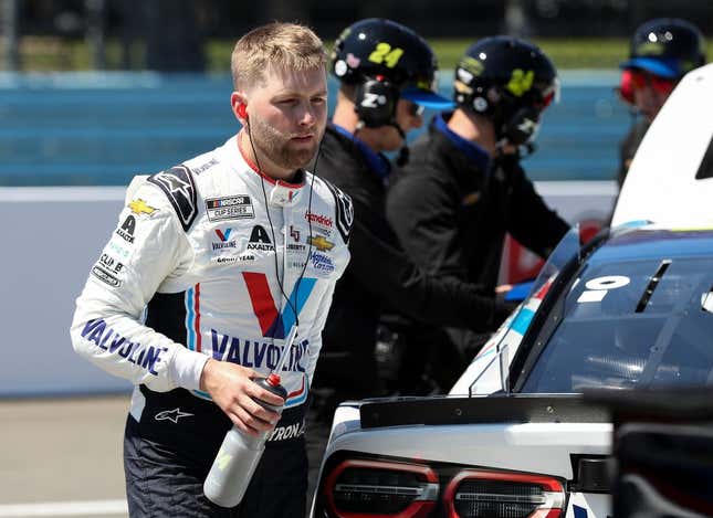 Aug 19, 2023; Watkins Glen, New York, USA; NASCAR Cup Series driver William Byron exits his race car during practice and qualifying for the Go Bowling at The Glen at Watkins Glen International.