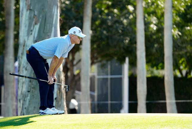 Steve Flesch looks over his putt on the ninth hole during round one of the Charles Schwab Cup at Phoenix Country Club.