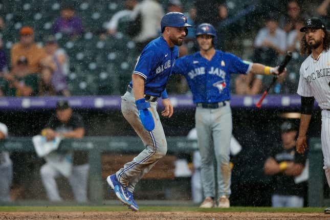 Sep 3, 2023; Denver, Colorado, USA; Toronto Blue Jays shortstop Mason McCoy (10) scores on an RBI in the ninth inning against the Colorado Rockies at Coors Field.