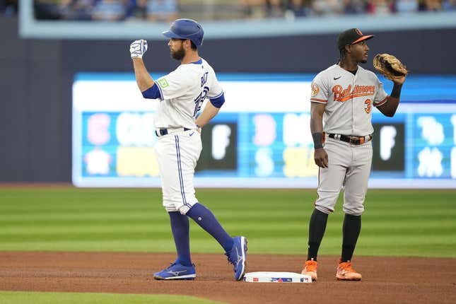 Aug 2, 2023; Toronto, Ontario, CAN; Toronto Blue Jays first baseman Brandon Belt (13) gestures to his dugout after hitting a double against the Baltimore Orioles during the fourth inning at Rogers Centre.