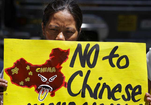 An activist at the Chinese consulate in the Philippines