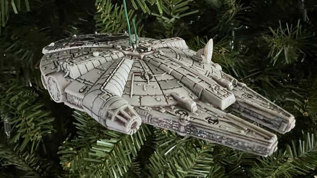 the millennium falcon hanging on a tree