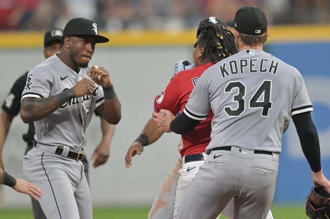 Aug 5, 2023; Cleveland, Ohio, USA; Chicago White Sox shortstop Tim Anderson (7) raises his fists to fight Cleveland Guardians third baseman Jose Ramirez (11) during the sixth inning at Progressive Field.