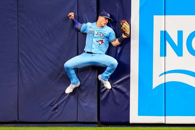 Jun 20, 2023; Miami, Florida, USA; Toronto Blue Jays left fielder Daulton Varsho (25) catches a fly ball against the Miami Marlins during the ninth inning at loanDepot Park.