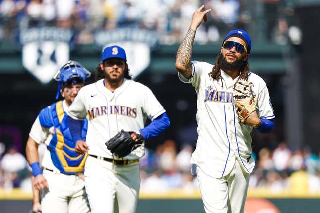 Aug 27, 2023; Seattle, Washington, USA; Seattle Mariners shortstop J.P. Crawford (3) celebrates following a 3-2 victory against the Kansas City Royals at T-Mobile Park.