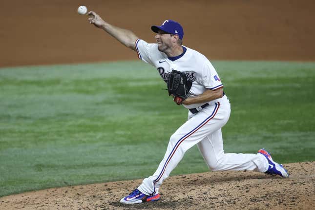 Aug 14, 2023; Arlington, Texas, USA; Texas Rangers starting pitcher Max Scherzer (31) pitches against the Los Angeles Angels in the fifth inning at Globe Life Field.