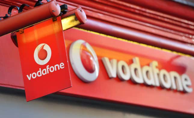 The Vodafone logo on display outside a retail shop in London in January 2018.