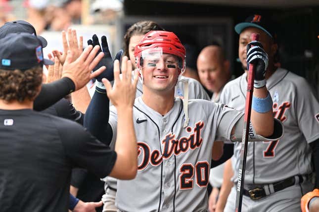 Jun 18, 2023; Minneapolis, Minnesota, USA; Detroit Tigers first baseman Spencer Torkelson (20) is greeted after hitting a two run home run during the fifth inning against the Minnesota Twins at Target Field.