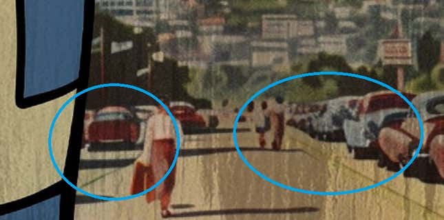 People walk in the middle of the street.