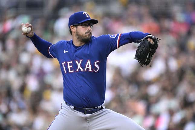 Jul 28, 2023; San Diego, California, USA; Texas Rangers starting pitcher Dane Dunning (33) throws a pitch against the San Diego Padres during the first inning at Petco Park.