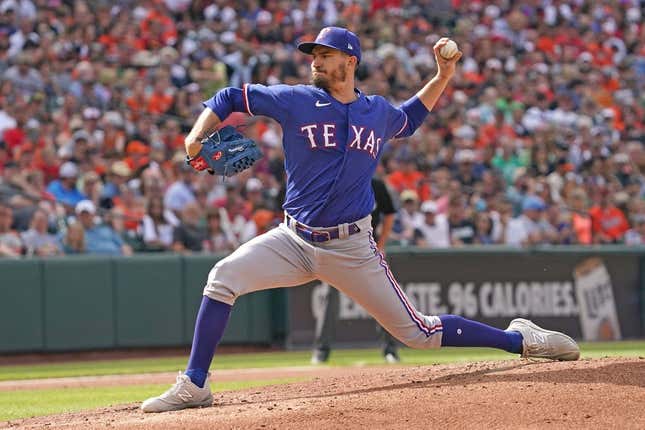 May 27, 2023; Baltimore, Maryland, USA; Texas Rangers starting pitcher Andrew Heaney (44) pitches in the third inning against the Baltimore Orioles at Oriole Park at Camden Yards.