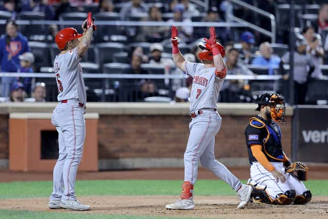 Sep 15, 2023; New York City, New York, USA; Cincinnati Reds first baseman Spencer Steer (7) celebrates his two run home run against the New York Mets with third baseman Nick Senzel (15) during the sixth inning at Citi Field.