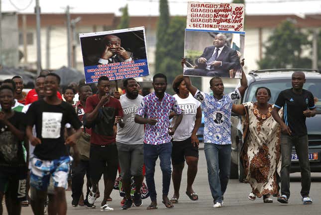Gbagbo supporters celebrate in Abidjan’, Ivory Coast.