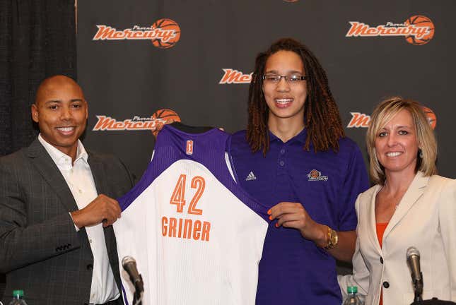 Brittney Griner (C) of the Phoenix Mercury poses with head coach Corey Gaines (L) and President/COO Amber Cox (R) during a press conference after being selected as the first pick in the 2013 WNBA Draft at US Airways Center on April 20, 2013 in Phoenix, Arizona.