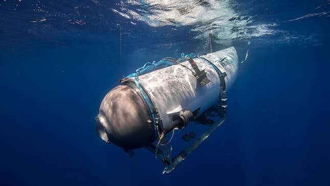 A photo of the Titan submersible diving beneath the ocean. 