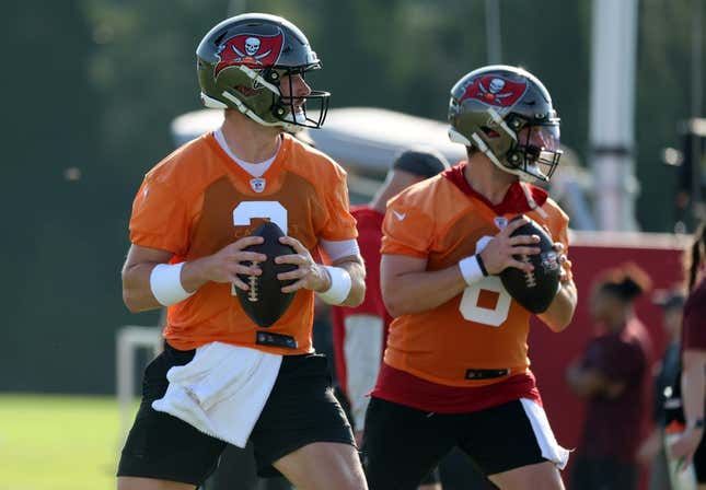 Jul 30, 2023; Tampa, FL, USA; Tampa Bay Buccaneers quarterback Kyle Trask (2) and Tampa Bay Buccaneers quarterback Baker Mayfield (6) work out during training camp at AdventHealth Training Center.