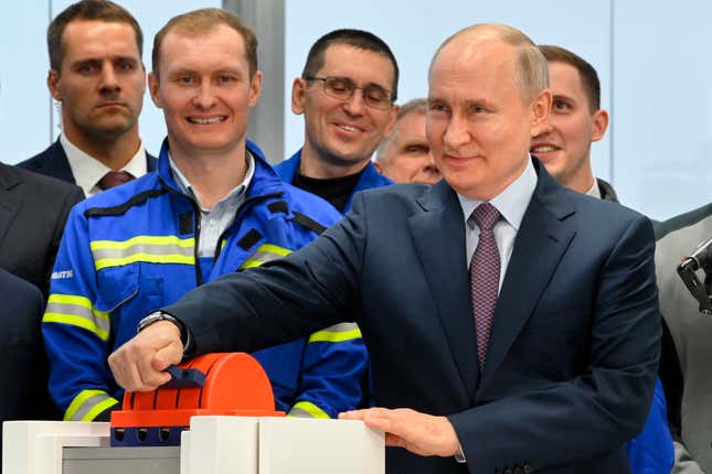 FILE - Russian President Vladimir Putin, foreground right, attends the launch ceremony for the first technological line for liquefying natural gas on gravity bases as part of the Arctic LNG2 (Liquefied Natural Gas) project at the Center for the construction of large-tonnage offshore structures (CSCMS) of Novatek-Murmansk company in the village of Belokamenka, about 1700 km (1063 miles) north of Moscow, Murmansk region, Russia, Thursday, July 20, 2023. The U.S. is sanctioning a newly established UAE company, which provides engineering and technology that Western corporations previously offered, to Russia’s Arctic liquefied natural gas project, as well as multiple Russian companies involved in its development. (Alexander Kazakov, Sputnik, Kremlin Pool Photo via AP, File)
