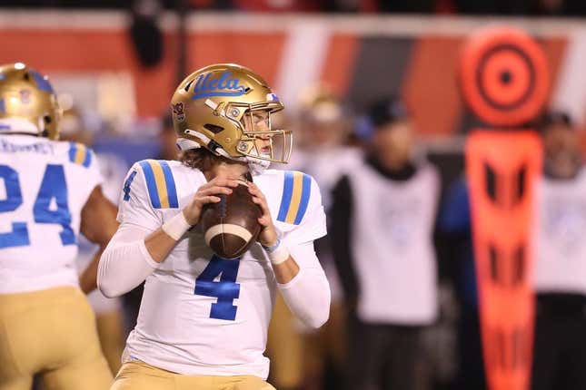 Oct 30, 2021; Salt Lake City, Utah, USA; UCLA Bruins quarterback Ethan Garbers (4) drops back to pass the ball during the first quarter against the Utah Utes at Rice-Eccles Stadium.