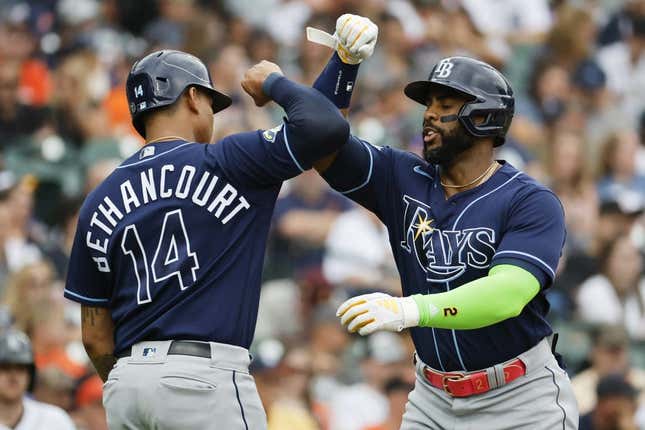 Aug 6, 2023; Detroit, Michigan, USA; Tampa Bay Rays first baseman Yandy Diaz (2) receives congratulations from catcher Christian Bethancourt (14) after he hits a two run home run in the second inning against the Detroit Tigers at Comerica Park.