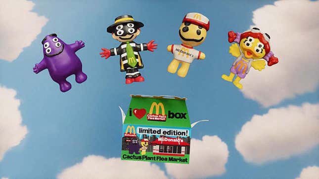 A line of McDonalds Adult Happy Meal toys.