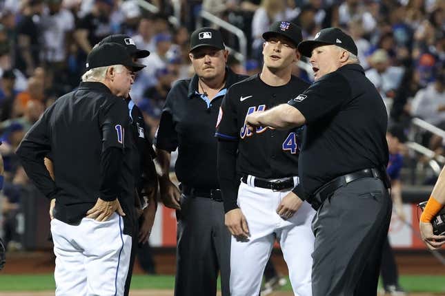 Jun 13, 2023; New York City, New York, USA; New York Mets relief pitcher Drew Smith (40) is ejected by umpire Bill Miller (26) during the seventh inning against the New York Yankees at Citi Field.