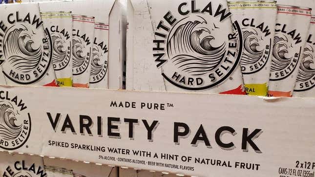 Pallet of White Claw variety packs at a grocery store