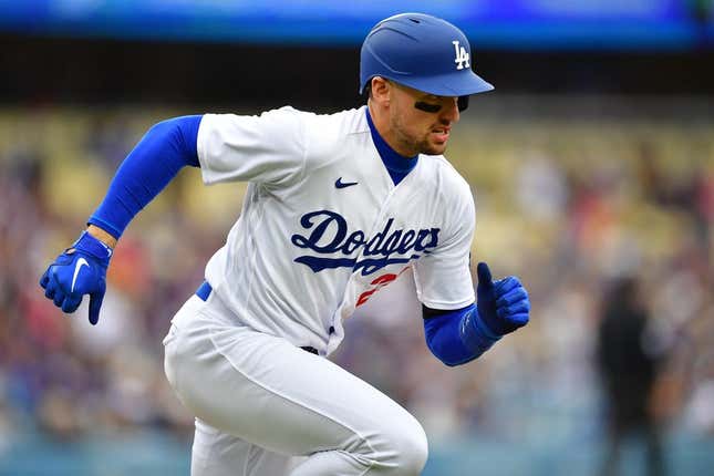 May 31, 2023; Los Angeles, California, USA; Los Angeles Dodgers center fielder Trayce Thompson (25) runs after hitting a single against the Washington Nationals during the fourth inning at Dodger Stadium.
