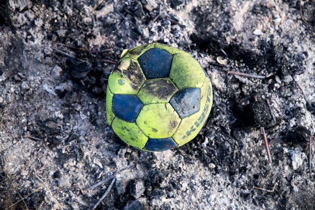 A soccer ball was abandoned after migrants left the makeshift camp in Calais on Oct. 27.