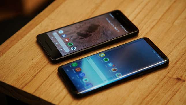 The Samsung S8, bottom, has a considerably larger screen than Google’s Pixel 2.