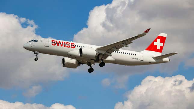 Swiss Airbus A220-300 aircraft or former Bombardier CS300 BD-500 model, as seen on final approach flying for landing at the runway of London Heathrow International Airport LHR.